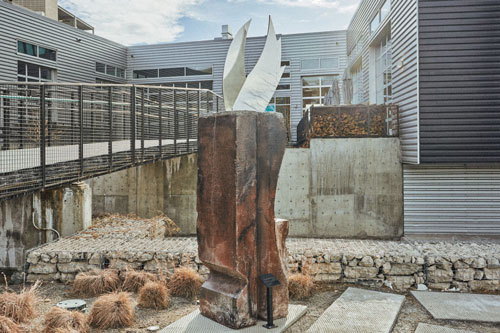 <i>Victoria's Secret </i>, 2018, Concrete, stainless steel, ash and enamel, 108 x 24 x 24 inches